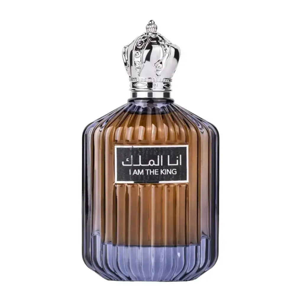 Luxueuze amber en paarse glazen parfumfles met zilveren kroon dop labeled i am the king van ard al zaafaran