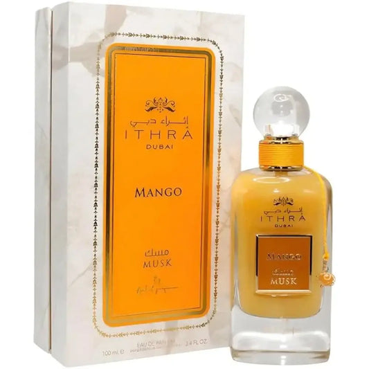Een goudkleurige rechthoekige glazen parfumfles met een heldere bolvormige dop en gouden accenten van ard al zaafaran ithra dubai mango musk