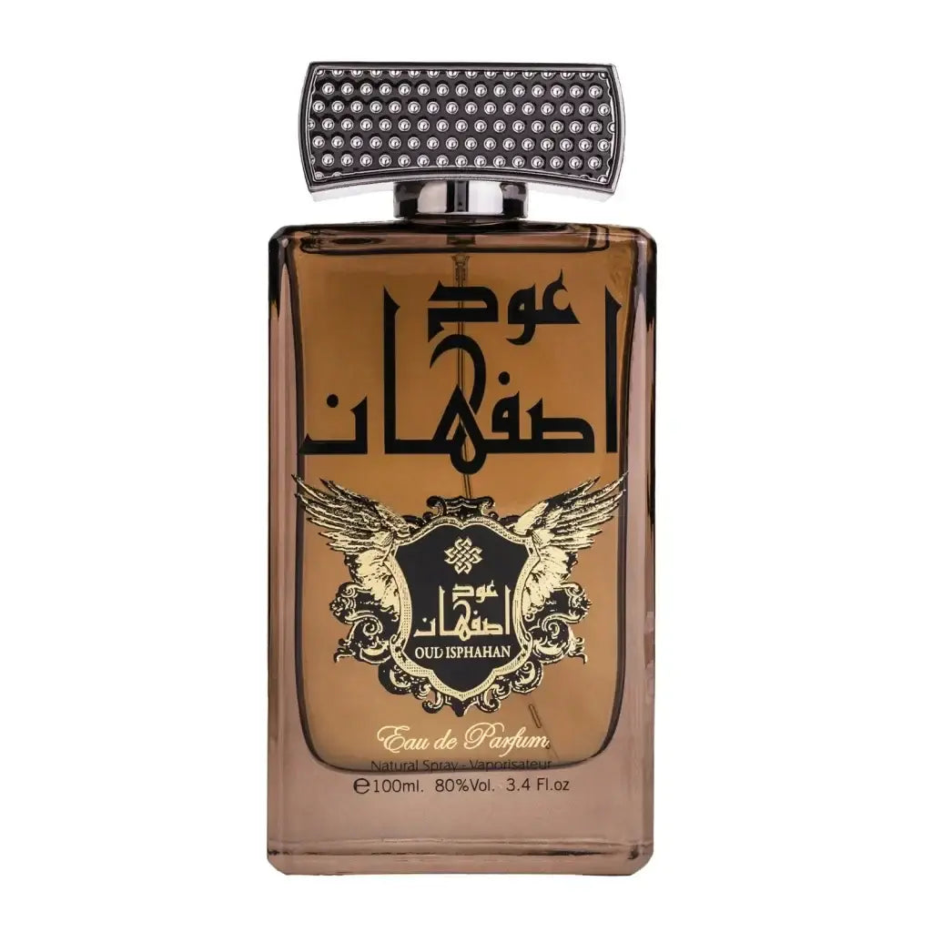 Een rechthoekige amberkleurige glazen fles met ard al zaafaran oud isphahan eau de parfum en een zilveren dop met stenen