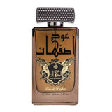 Een rechthoekige amberkleurige glazen fles met ard al zaafaran oud isphahan eau de parfum en een zilveren dop met stenen