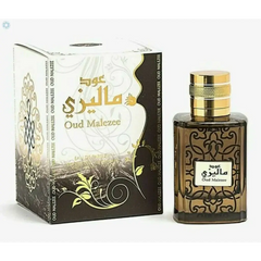 Ard al Zaafaran oud Malezee parfumfles met donker amber glas, zwarte filigraan en gepolijste goudkleurige dop