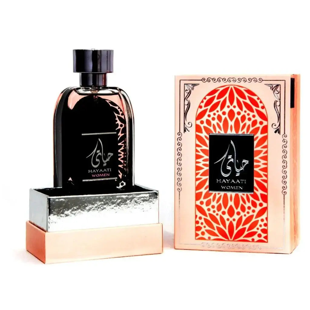 Zwarte glazen fles met een slank, gebogen ontwerp en zilveren arabische tekstlabel van ard al zaafaran parfum hayaati woman