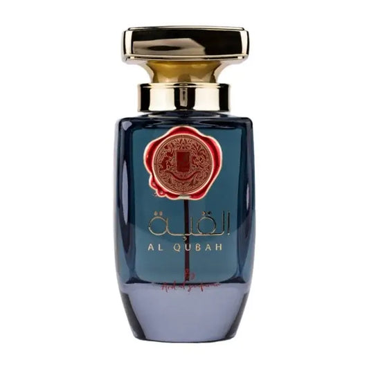 Diepblauwe glazen parfumfles met een gouden dop en een rood waszegel embleem gelabeld al qubah van Ard al Zaafaran al Qubah