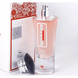 Een helder glazen fles ard al zaafaran rose paris bloom parfum met zilveren verstuiver en roze vloeistof