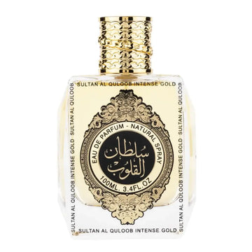 Een luxueuze goudaccent parfumfles met een doorzichtige glazen body en gegraveerd arabisch etiket van ard al zaafaran sultan al qaloob gold