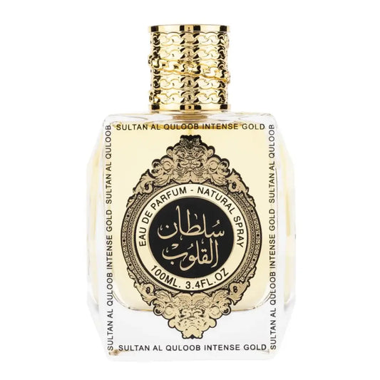 Een luxueuze goudaccent parfumfles met een doorzichtige glazen body en gegraveerd arabisch etiket van ard al zaafaran sultan al qaloob gold