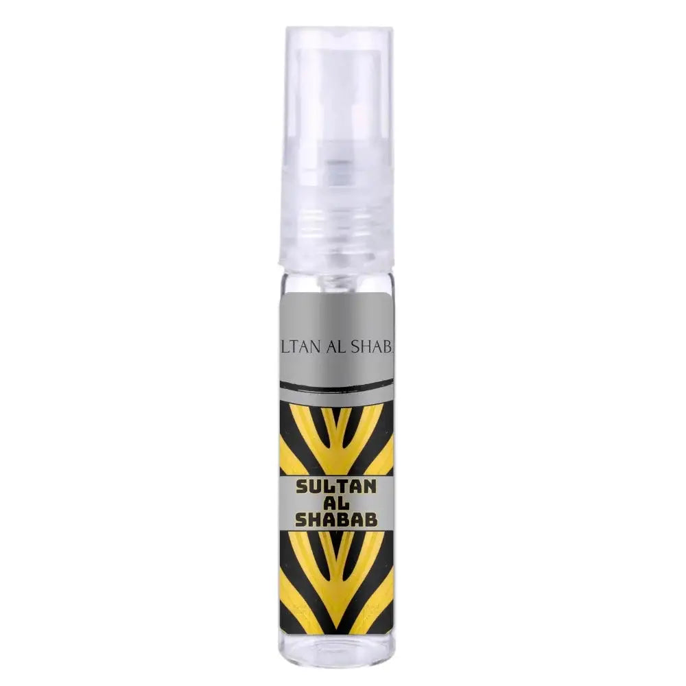 Heldere glazen sprayfles met zilver en zwart label met gele zebra strepen, sultan al shabab parfum van ard al zaafaran