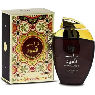 Donker amberkleurige glazen fles met goudkleurige dop en gegraveerd arabisch schrift met turab al oud geur van ard al zaafaran