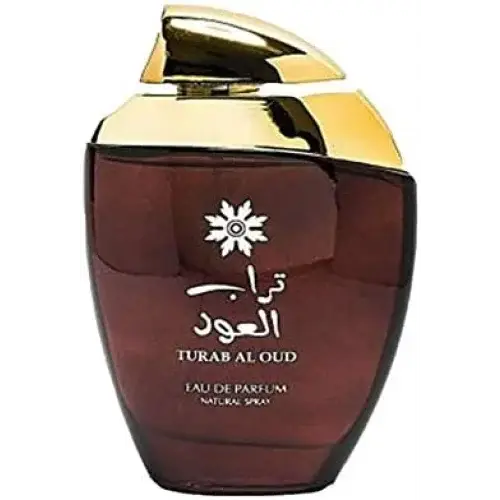 Een slanke donkere amberkleurige glazen fles met een gepolijste gouden dop en gegraveerd arabisch opschrift turab al oud van ard al zaafaran