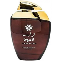 Een slanke donkere amberkleurige glazen fles met een gepolijste gouden dop en gegraveerd arabisch opschrift turab al oud van ard al zaafaran