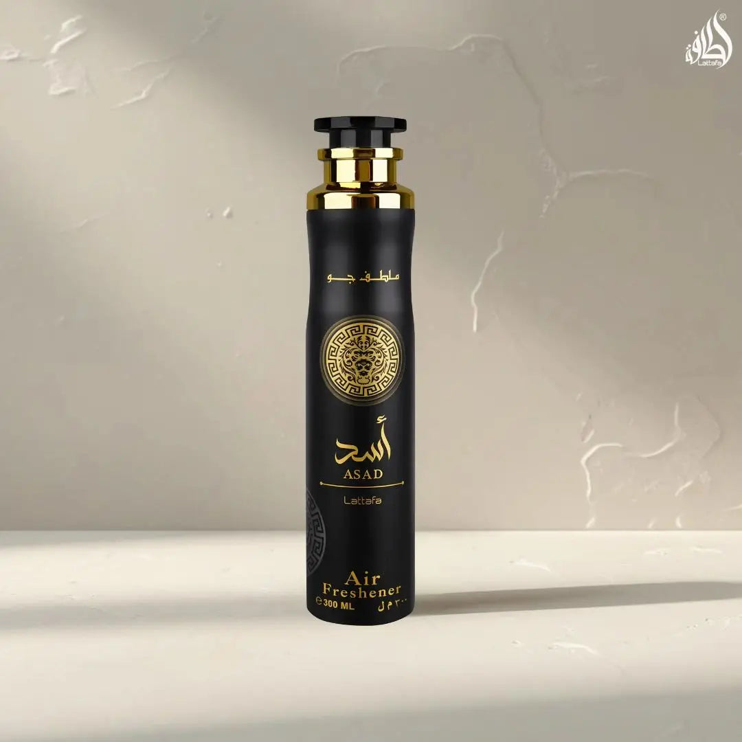 Zwarte cilindervormige asad luchtverfrisser 300ml met gouden accenten en arabische sierlijke cirkelvormige embleem