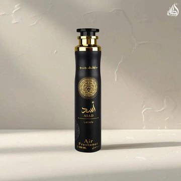 Zwarte cilindervormige asad luchtverfrisser 300ml met gouden accenten en arabische sierlijke cirkelvormige embleem