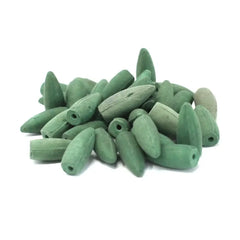 Een stapel groene kegelvormige wierookkegels - Frankincense & Myrrh