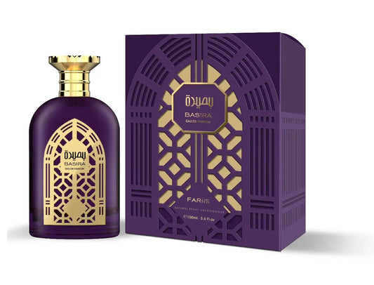 Diep paarse glazen fles basira edp met gouden geometrische details en matching gouden dop naast sierlijke doos