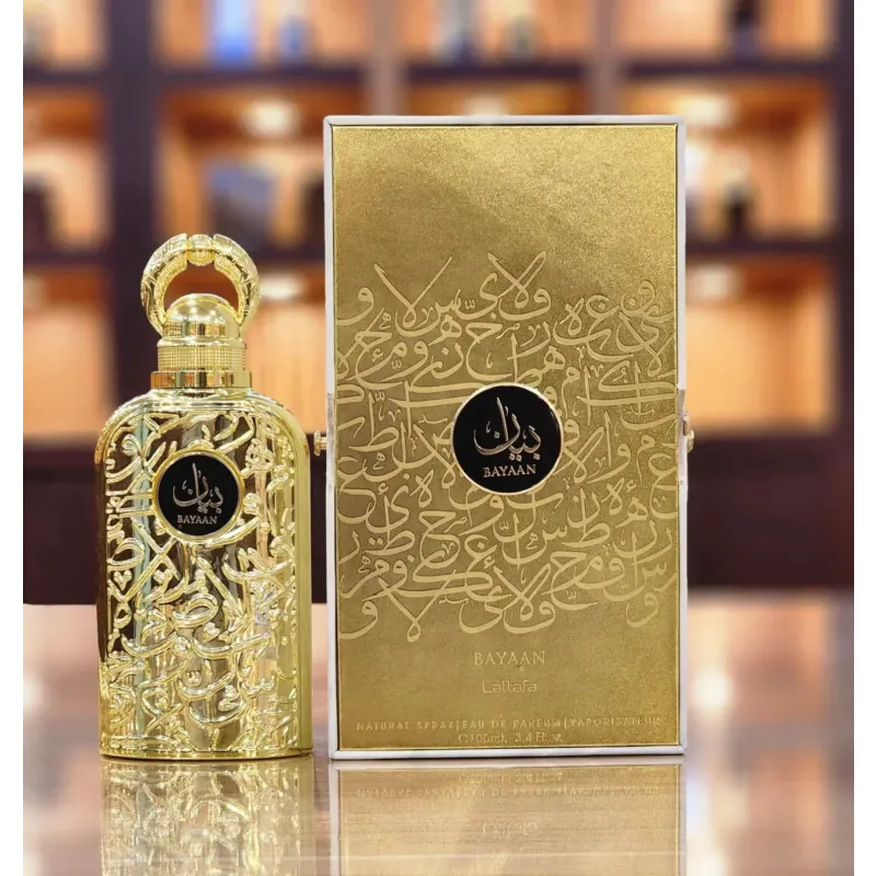 Ornate gold Bayaan - Lattafa perfume bottle with Arabic calligraphy and packaging box