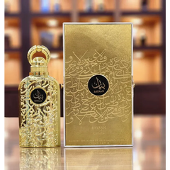 Ornate gold Bayaan - Lattafa perfume bottle with Arabic calligraphy and packaging box