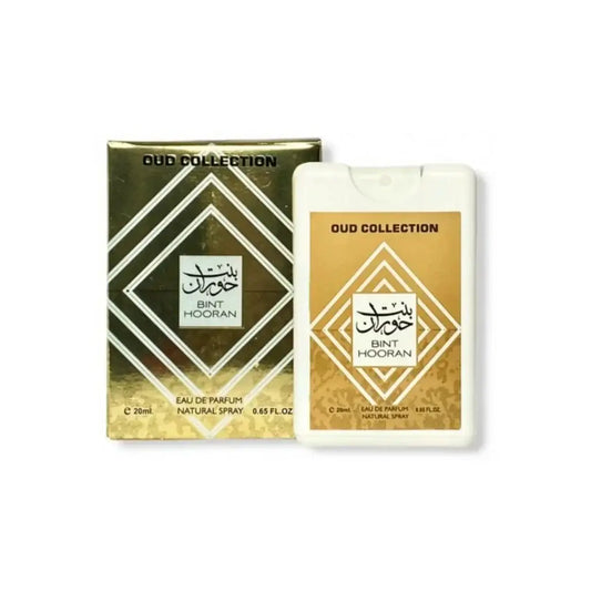 Witte rechthoekige reis sprayfles met goud-wit geometrisch ontwerp en arabische tekst labeled oud collection bint hooran