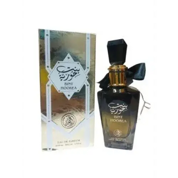 Donkere glazen fles bint hoorea eau de parfum met zwarte geslepen dop gouden accenten en elegant zwart lint