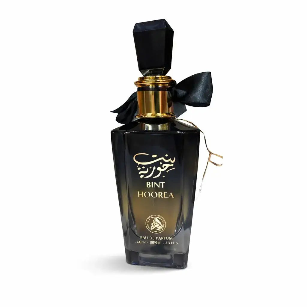 Zwarte glazen parfumfles met gouden accenten en zwarte strik bint hoorea eau de parfum al fakhr