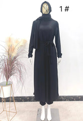 Mooie matte burkini Oulfa: zwarte col maxi jurk met riem en lange mouwen
