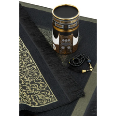 Ornate Arabic prayer mat with golden patterns for Cadeauset gebed cilinder