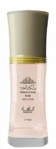 Een slanke doorzichtige glazen fles molkat al arab rose body lotion met metalen zilveren dop en gouden band in cadeauset lovely heren en dames
