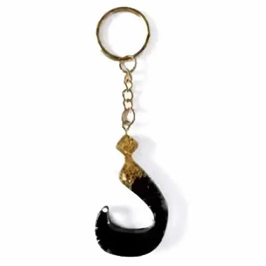 Black resin sleutelhanger dhaal met goudkleurige metalen haak en ketting arabisch alfabet design