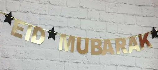 Eid letterslinger goud met zwarte sterren - Islamboekhandel.nl
