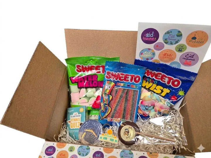 Een kleurrijke selectie sweeto snoepzakjes inclusief watermeloen en rainbow twist in een eid mubarak pretbox cadeauverpakking