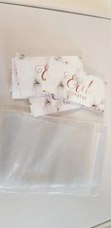 Witte rechthoekige eid mubarak traktatiezakjes marmer ongevuld met roségouden sierlijke tekst en zwarte bloemenprint