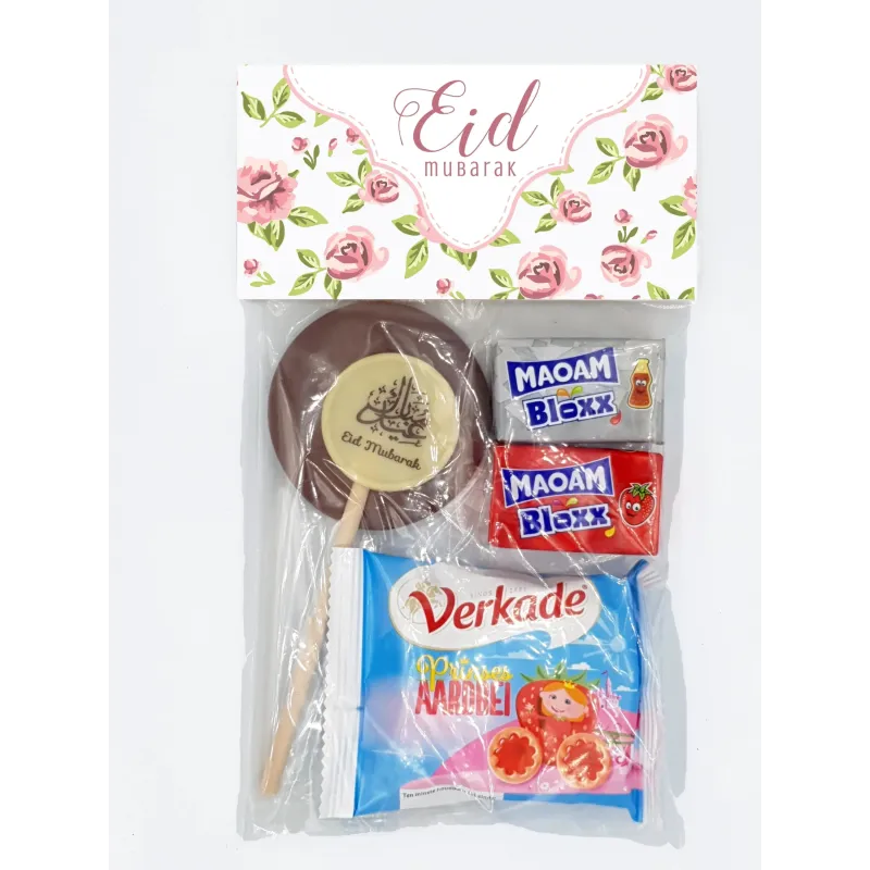 Een feestelijke eid mubarak traktatiezakjes vintage rose ongevuld met chocolade lollie eid mubarak en snoepreepjes
