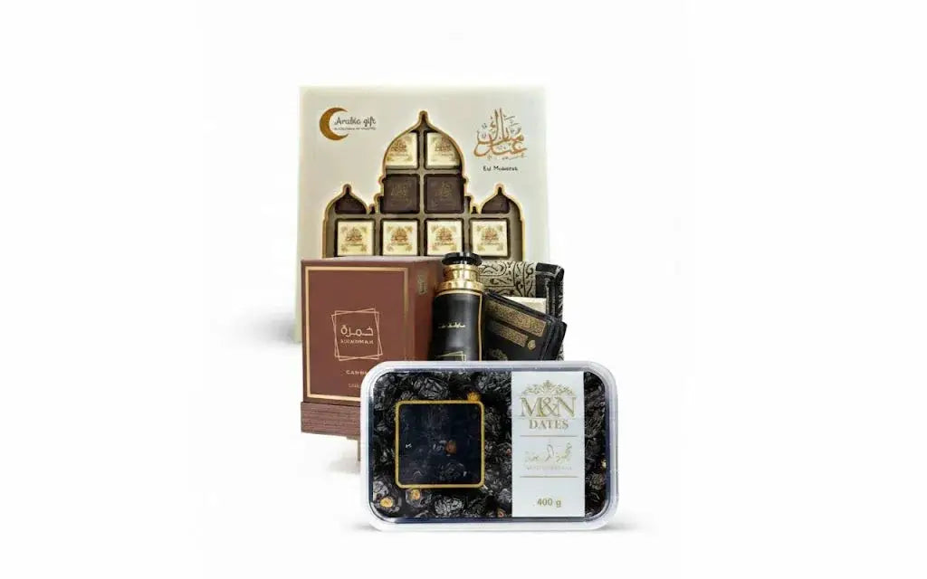 Zwart en goudkleurig ornament parfumflesje met verfijnde details uit exclusieve giftset kaaba