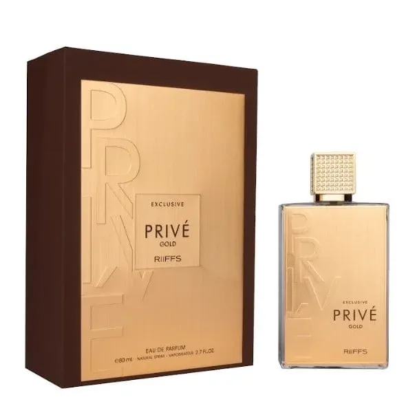 Goldkleurige parfumfles en bijpassende doos voor Exclusive Prive Gold met zwarte bessen