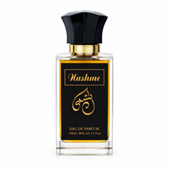 Een slanke rechthoekige glazen fles nashme eau de parfum met een zwarte facettendop en gouden accenten