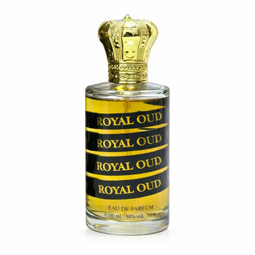 Een heldere glazen fles al fakhr royal oud eau de parfum met een gouden kroonkapsel en een zwart label met gouden tekst