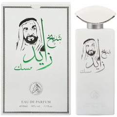 Witte rechthoekige parfumfles met zilveren dop en zwart-groportret van sheikh zayed bin sultan al nahyan genaamd sheikh zayed musk
