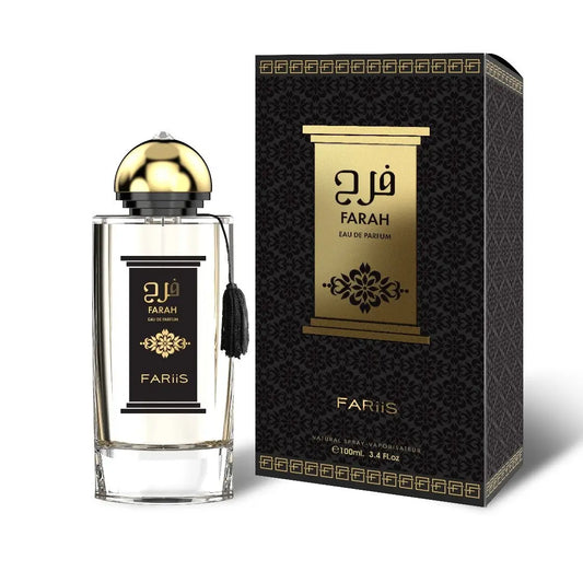 Elegante transparante glazen fles farah eau de parfum met gouden koepeldop en zwart label naast zwarte en gouden verpakking