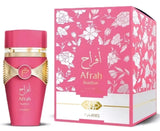 Roze afrah bonbon edp parfumfles met gouden accenten en decoratieve strik voor damesgeurgebruik