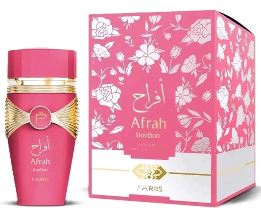Roze afrah bonbon edp parfumfles met gouden accenten en decoratieve strik voor damesgeurgebruik