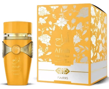Goudengele parfumfles afrah tropical zest met strak faceted ontwerp en gouden accenten