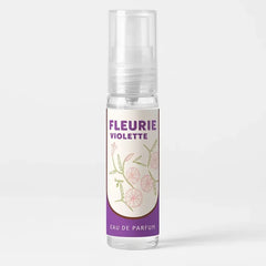 Transparante sprayfles van Fleurie Violette Arabische parfum artikelen met bloemenlabel