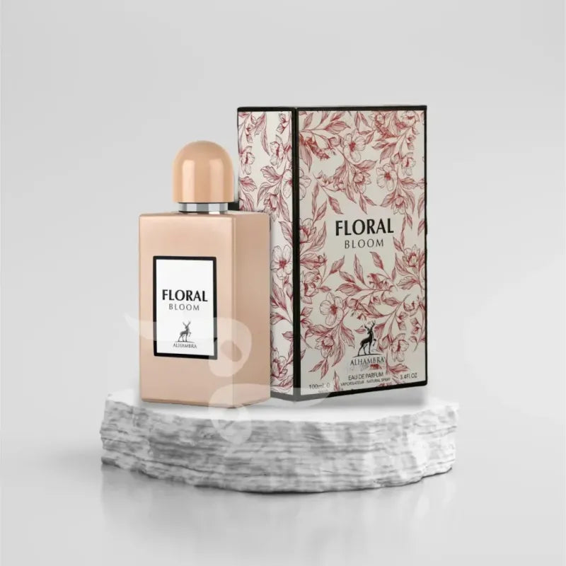 Roze gouden parfumfles en doos met Floral Bloom branding van Hambra EDP