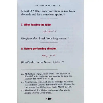 A printed page from fortress of the muslim book featuring arabic script and english text with red highlights of islamic supplications