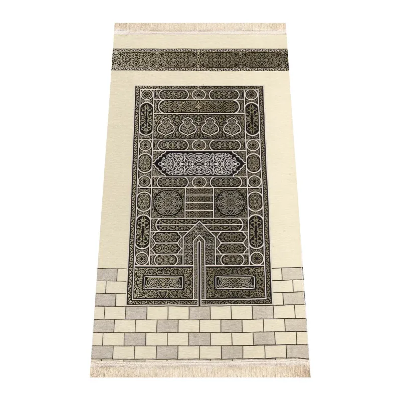 Crèmekleurig gebedskleed met Kaäba-patroon en zwarte geometrische patronen