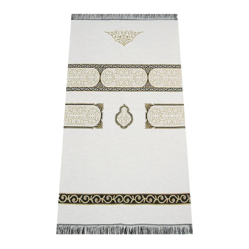 Wit gebedskleed met Kaäba-patroon, gouden en zwarte accenten, intricate patronen en franjes