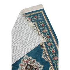 Blauw gebloemd tapijt met intricate patronen, kwastjes en mihrab ontwerp