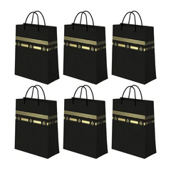 Zes zwarte Umrah giftbags mini met decoratieve gouden trimpatronen