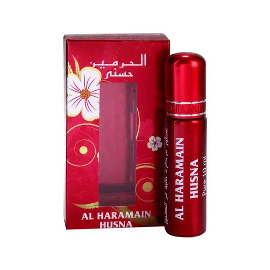 Rode metalen rollerball parfumfles met zilveren band en witte tekst van al haramain husna parfumolie