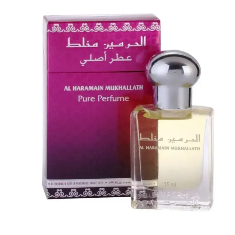 Een heldere glazen fles al haramain mukhallath pure parfumolie met zilveren dop en gouden vloeistof naast paarse doos