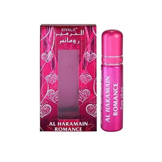Roze metalen rollerball parfumfles al haramain romance met zilveren letters en bijpassende hartvormige verpakking